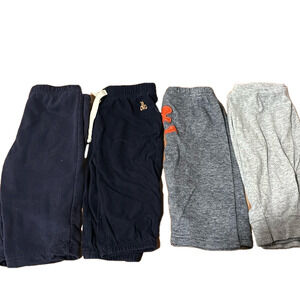4 pairs of 6-9 month baby pants- blue and gray-